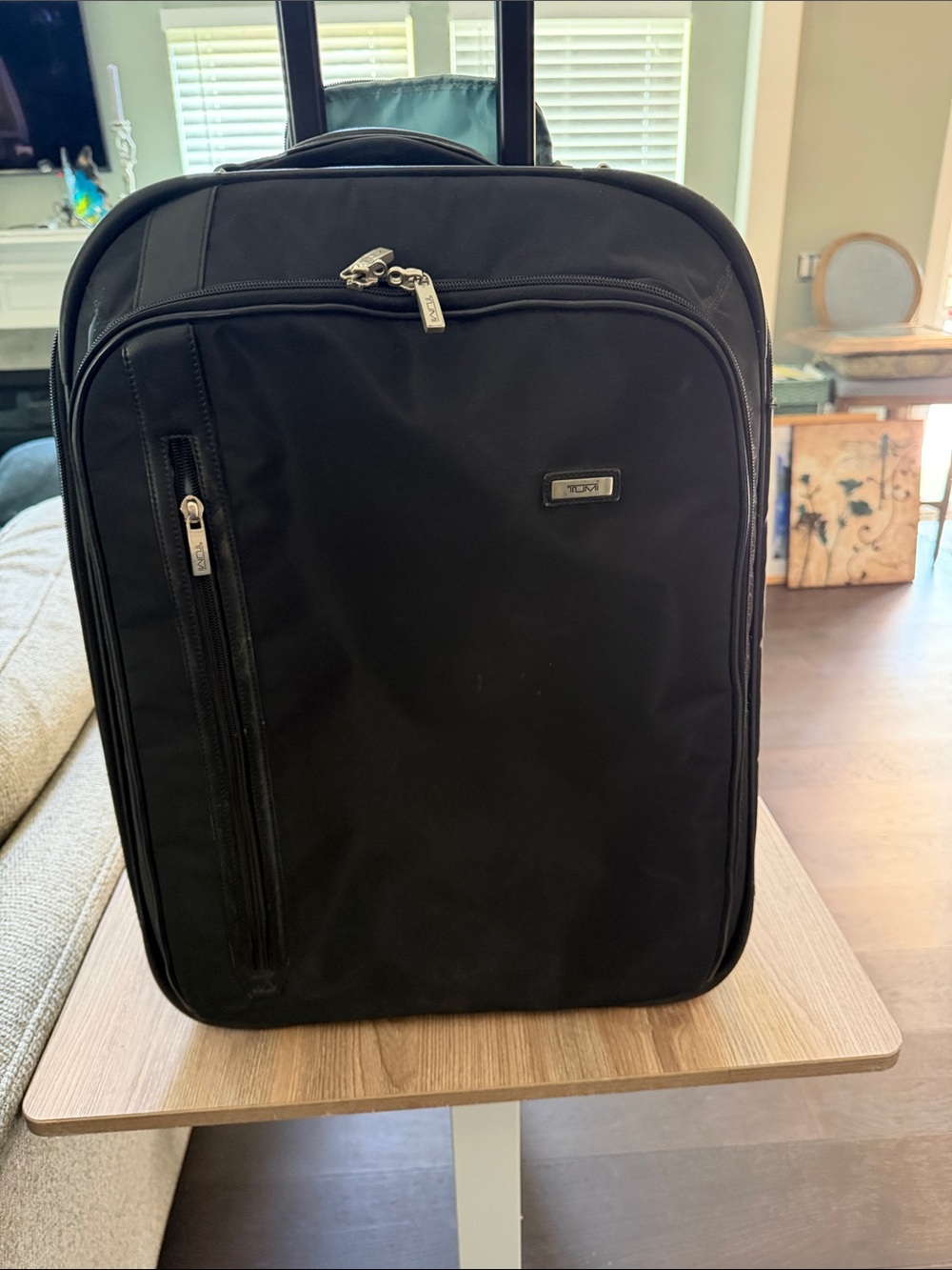 Tumi Black Rolling Carry-On with Front Zip Pocket